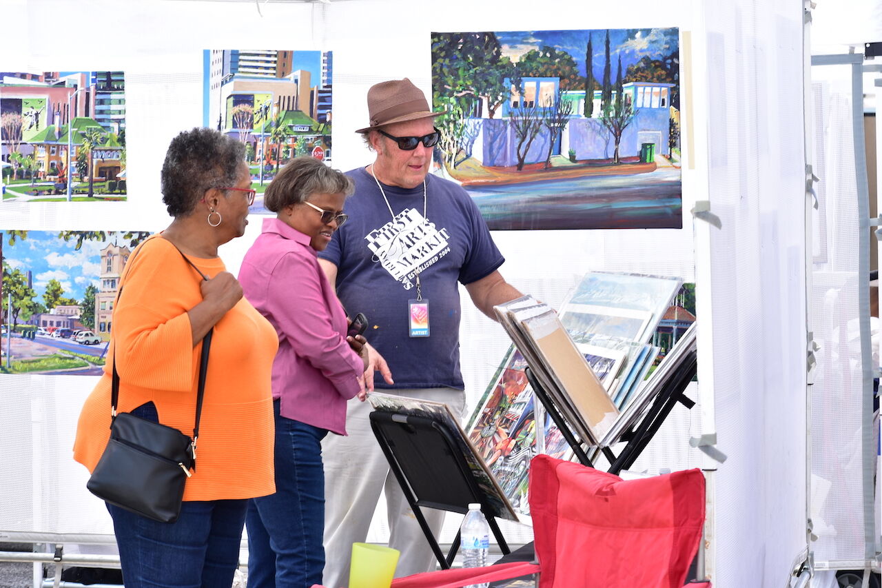 3) Plein-air painter Arthur Deatly talks about his work at First Saturday Arts Market.JPG